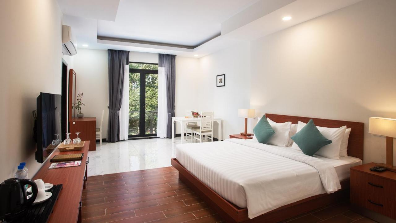 Angkor Sivutha Suites By Alfa Siem Reap Bagian luar foto